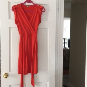 Orange Tie Dress with gold buttons on shoulder